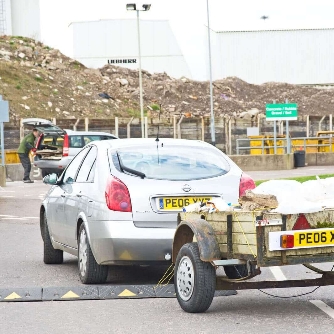 WADE BUILDING SUPPLIES | CAR DRIVING OVER SPEED HUMP